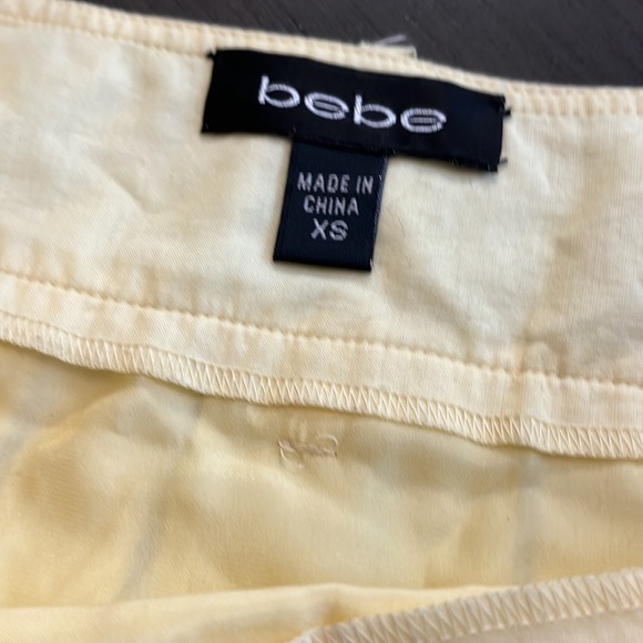 Cute yellow Bebe mini skirt - Picture 2 of 5